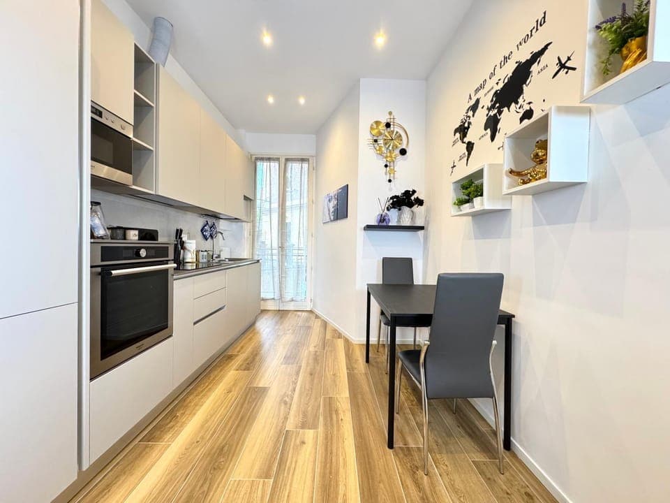 Kitchen or kitchenette, dishwasher, oven, stove