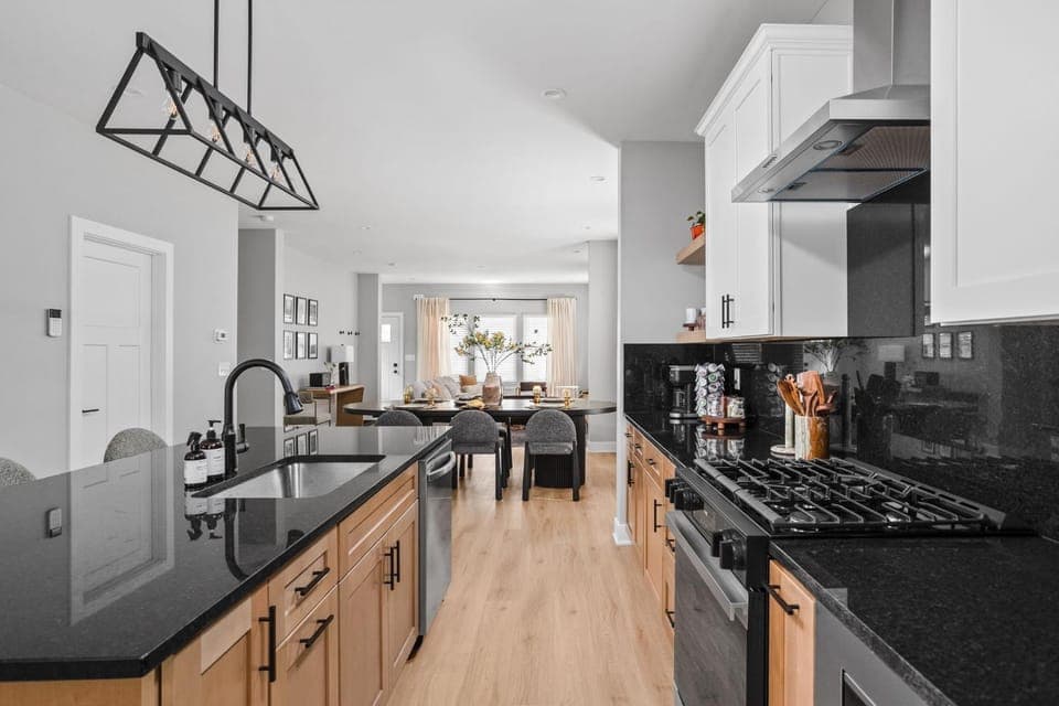 Kitchen or kitchenette, dishwasher, oven, stove