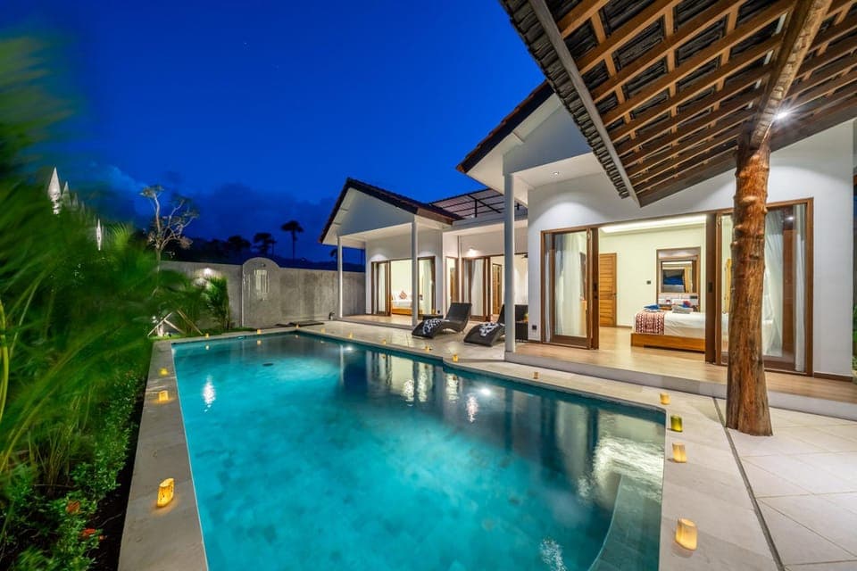 Property building, Patio, Night, Pool view, Swimming pool, sunbed