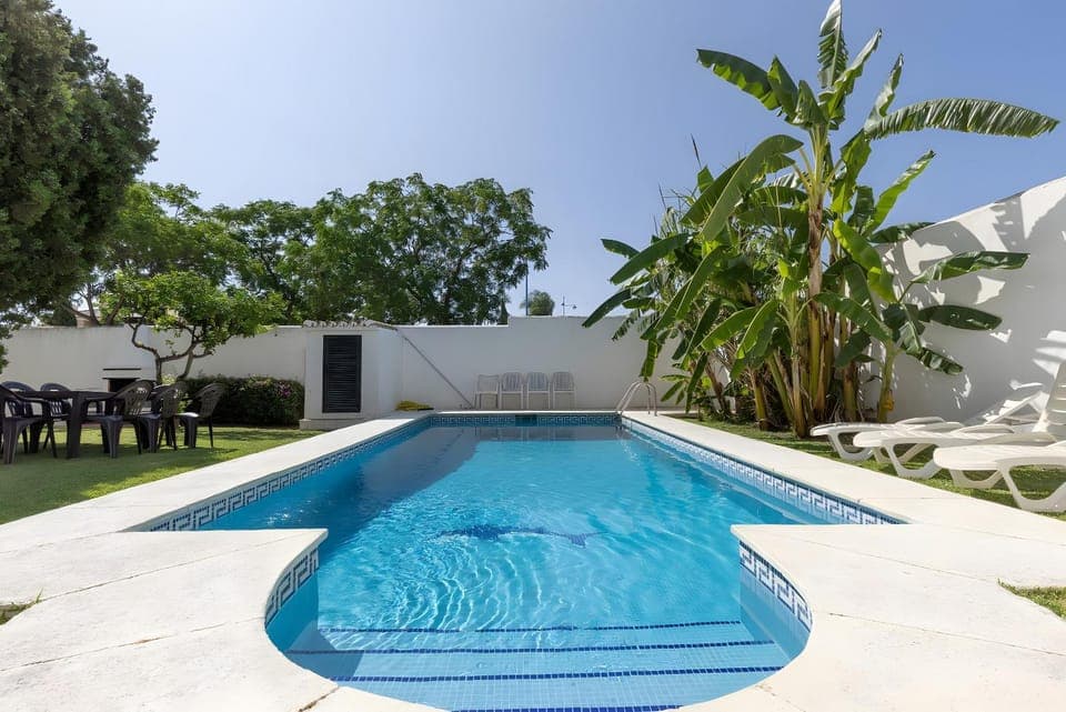 Property building, Living room, Swimming pool