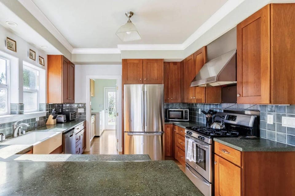 Kitchen or kitchenette, dishwasher, oven, stove, toaster, dryer