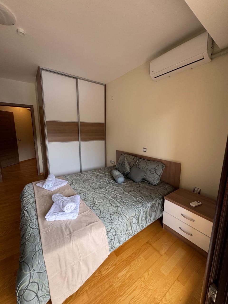 Bedroom, towels, wardrobe, air conditioner