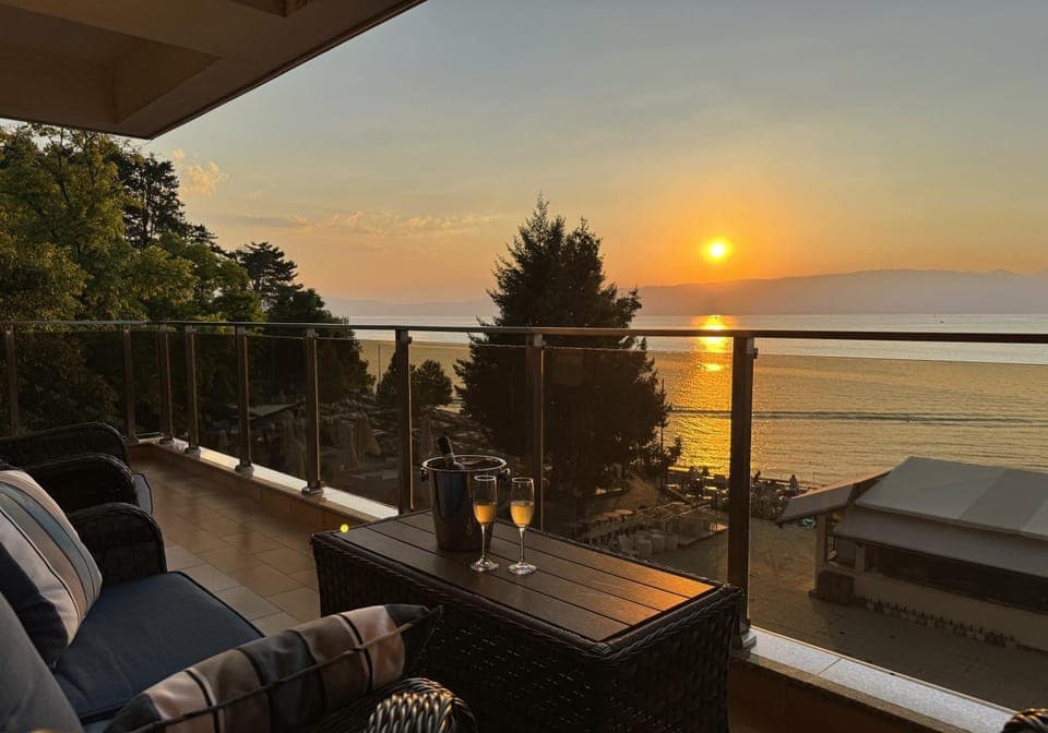 View (from property/room), Balcony/Terrace, Seating area, Lake view, Sunset