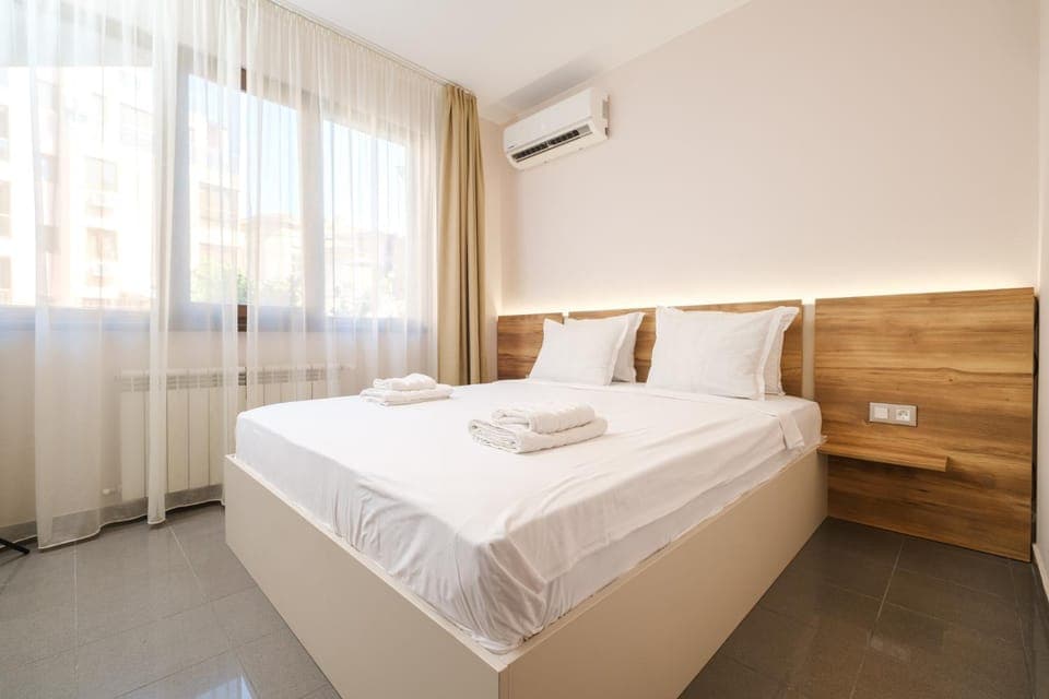 Bed, Photo of the whole room, Bedroom, towels, air conditioner