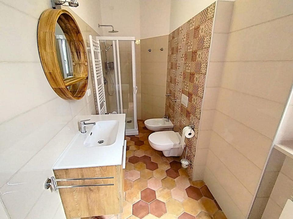 Shower, Toilet, bidet, towels