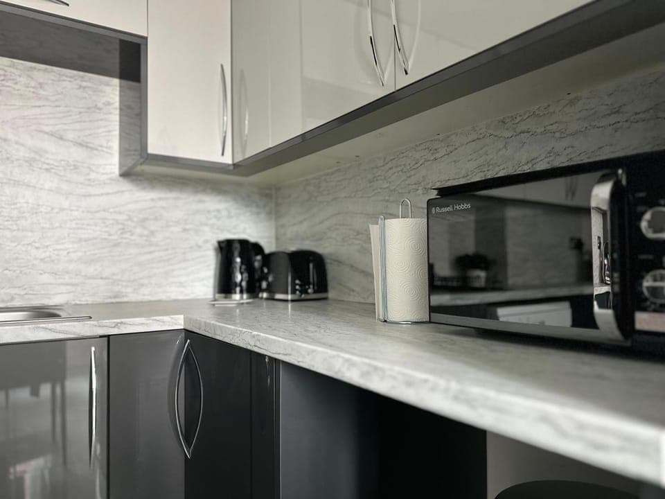 Kitchen or kitchenette, microwave