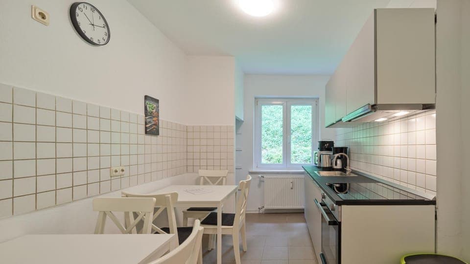Kitchen or kitchenette, Photo of the whole room, Dining area, stove