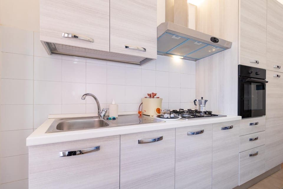 Kitchen or kitchenette, oven, stove