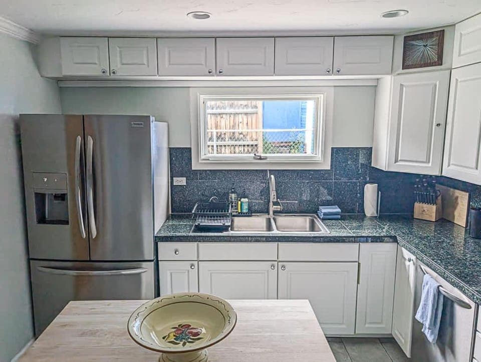 Kitchen or kitchenette, dishwasher, oven, stove, toaster