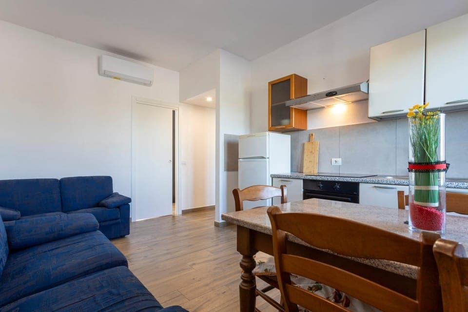 Kitchen or kitchenette, Living room, Seating area, Dining area, oven, stove, air conditioner