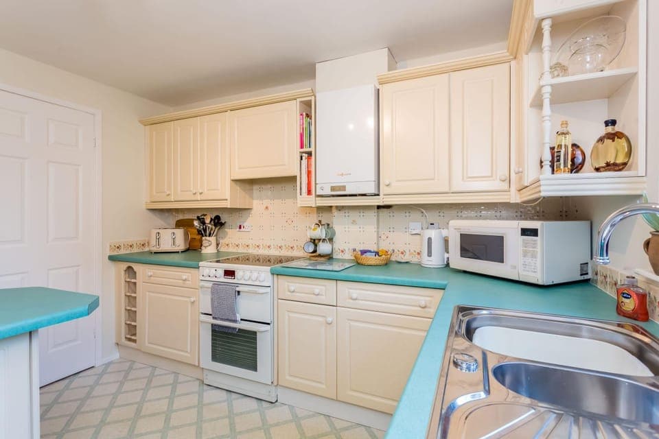 Kitchen or kitchenette, oven, stove, toaster