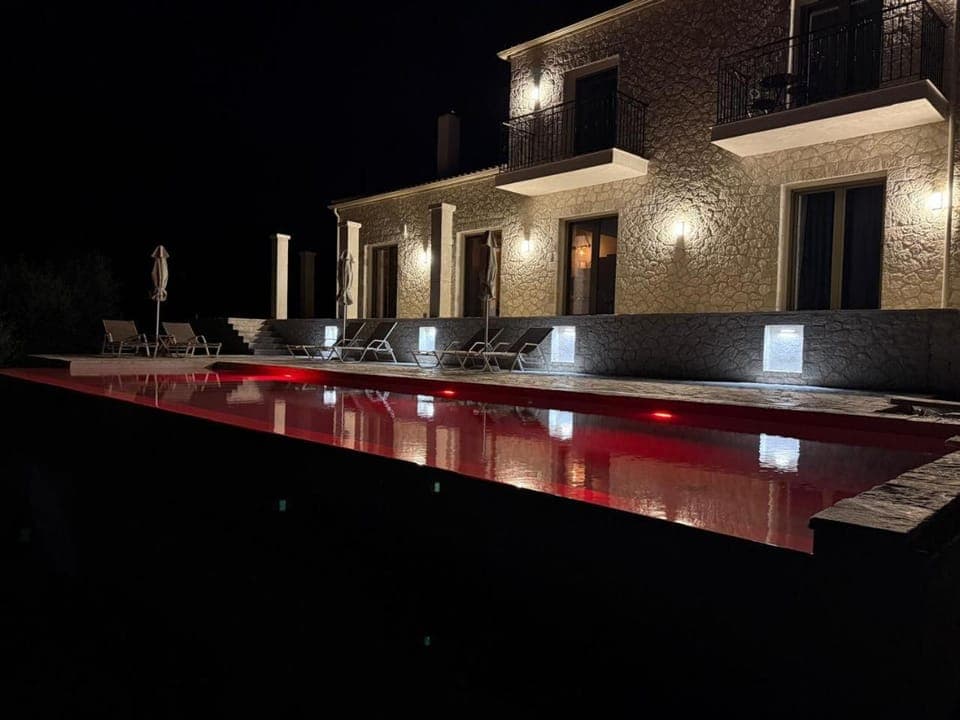 Property building, Night, Pool view, Swimming pool, sunbed