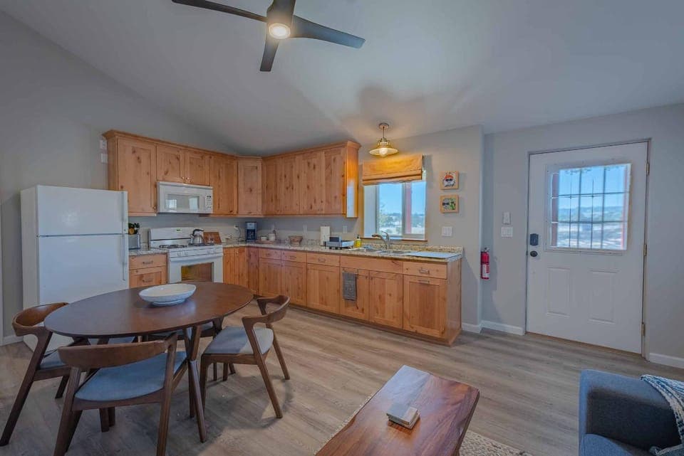 Kitchen or kitchenette, Seating area, Dining area, oven, stove, kitchen