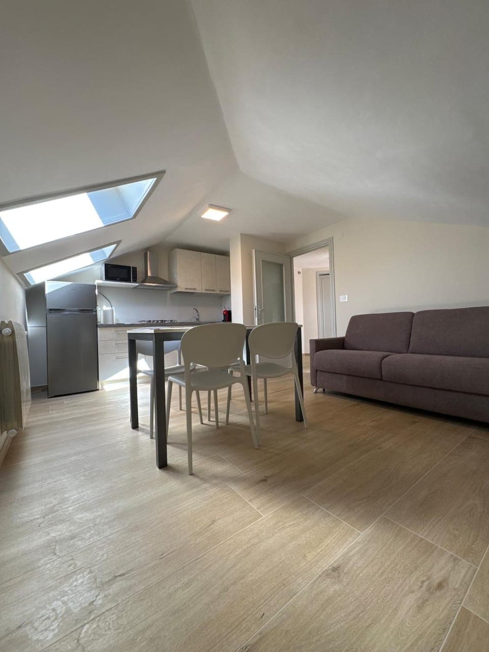 Kitchen or kitchenette, Living room, Seating area, Dining area