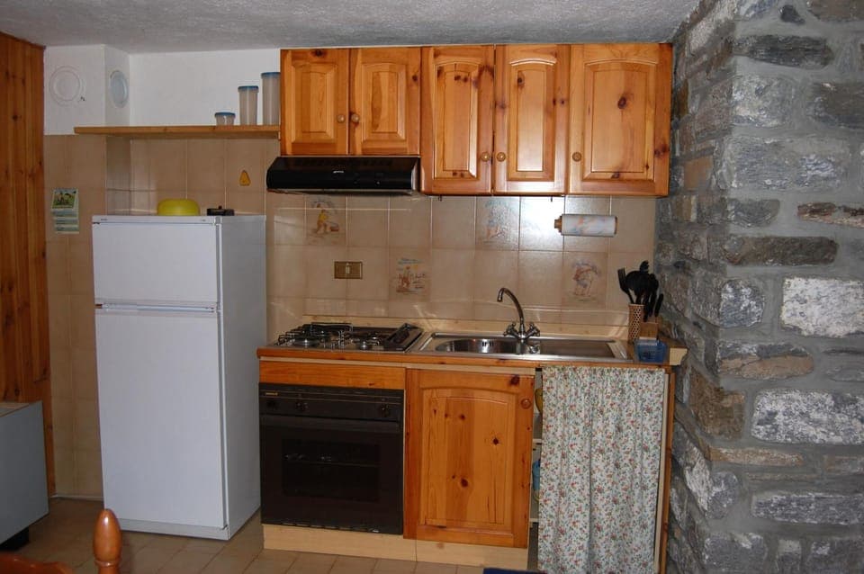 Kitchen or kitchenette, stove