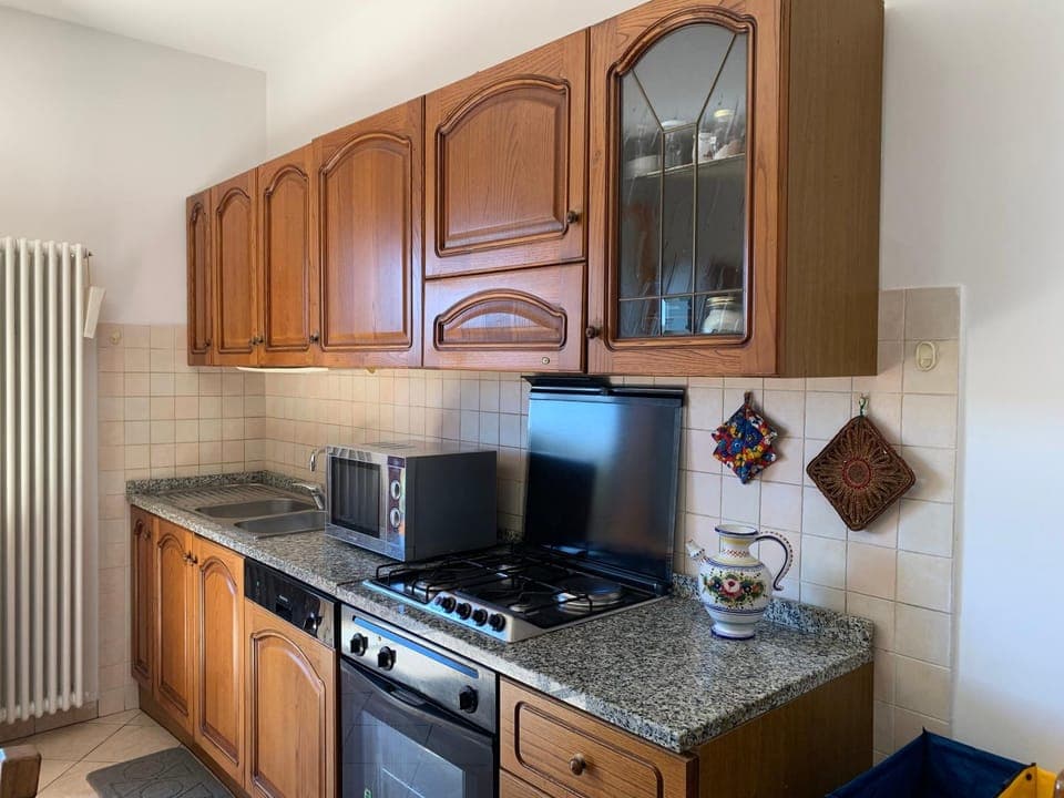 Kitchen or kitchenette, stove