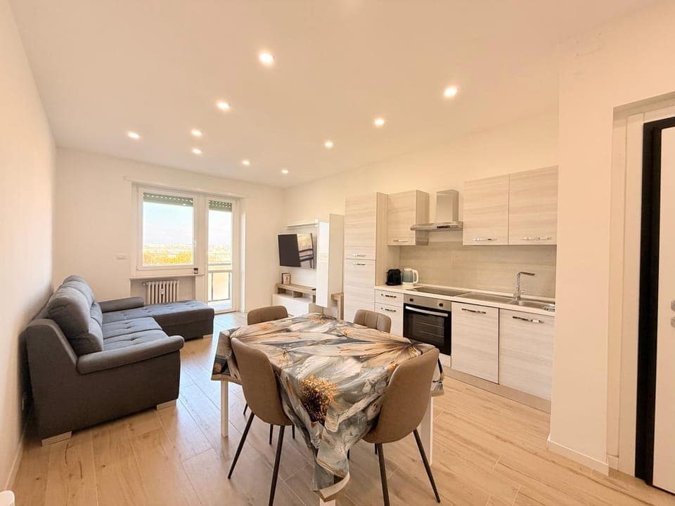 Kitchen or kitchenette, Living room, Seating area, Dining area