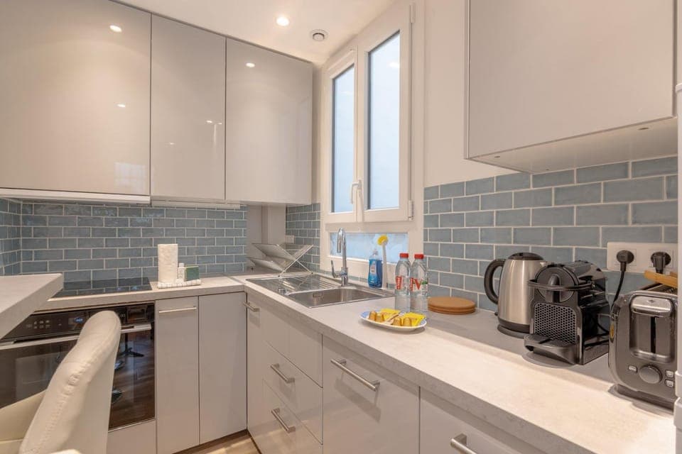 Kitchen or kitchenette, stove, toaster