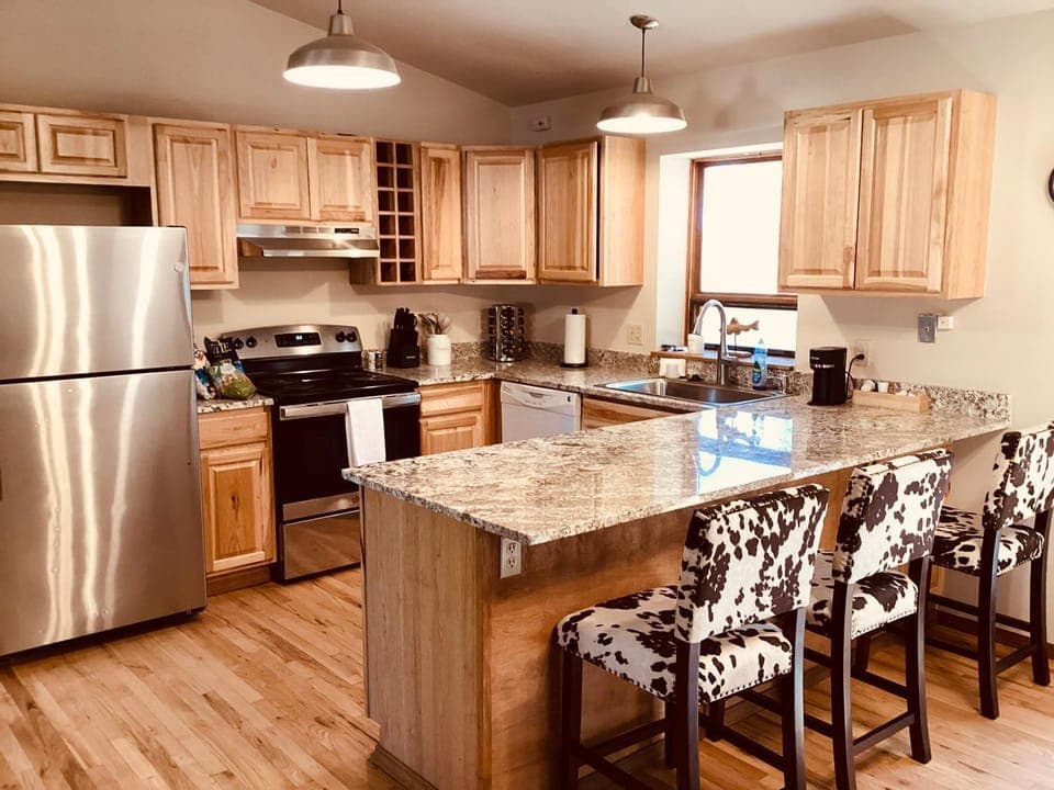 Kitchen or kitchenette, dishwasher, oven, stove, toaster