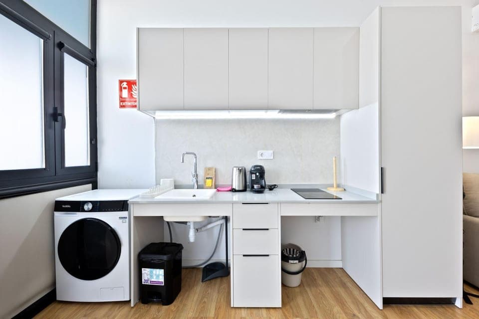 Kitchen or kitchenette, washing machine