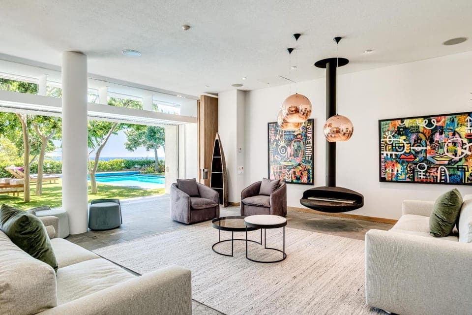 Living room, Decorative detail, Seating area, Garden view, Pool view