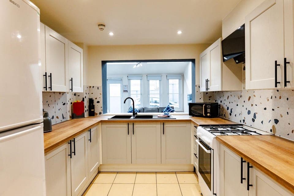 Kitchen or kitchenette, oven, stove, toaster