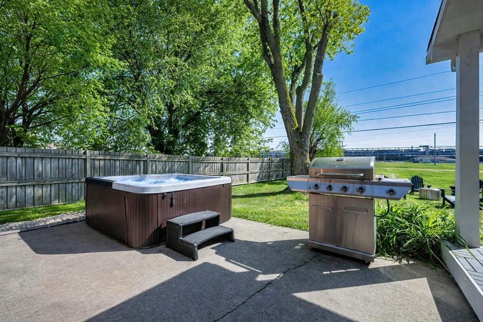Hot Tub - Fire Pit - Shuffleboard - Walk to Track - Family Friendly House in Indianapolis