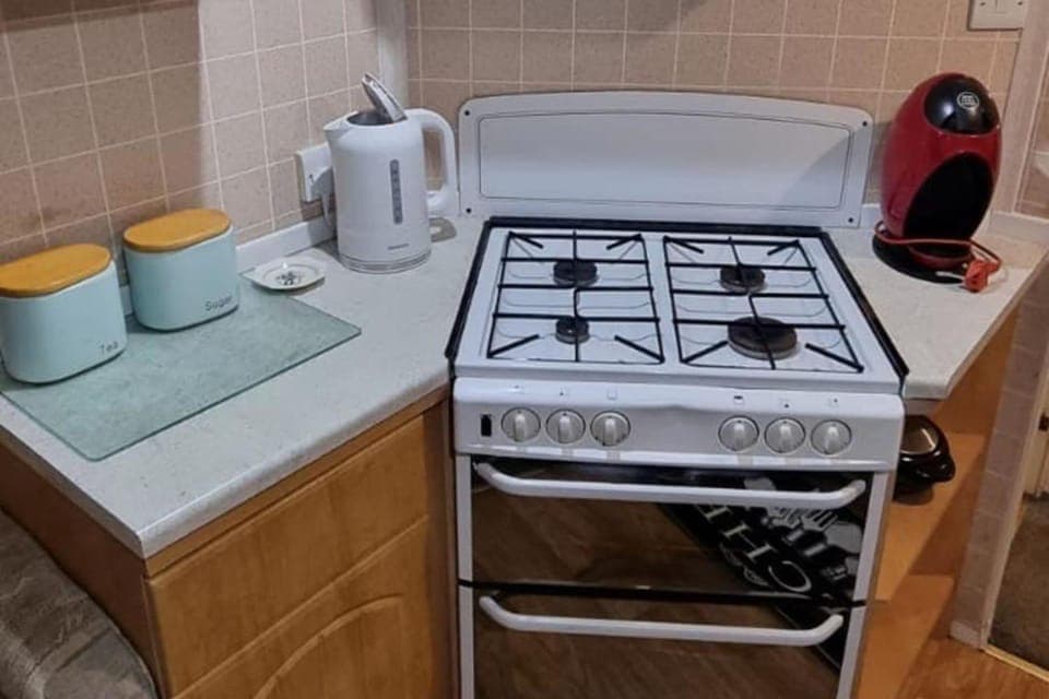 Kitchen or kitchenette, furniture, oven, stove