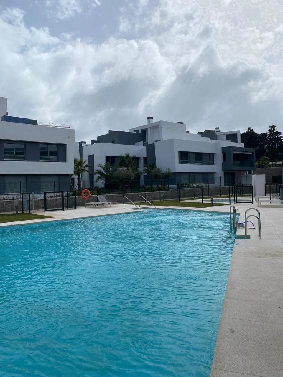 Property building, Swimming pool, Swimming pool, sunbed