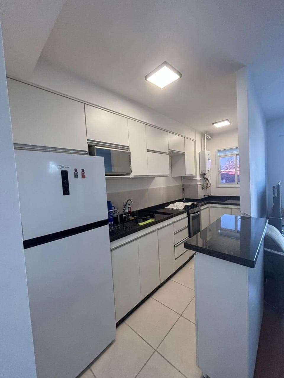 Kitchen or kitchenette, oven, stove, toaster