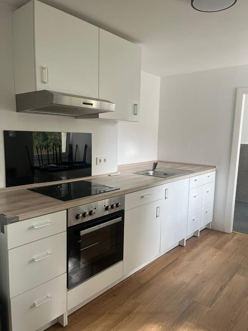 Kitchen or kitchenette, oven, stove