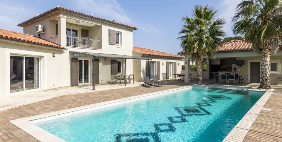 Property building, Patio, Pool view, Swimming pool, sunbed