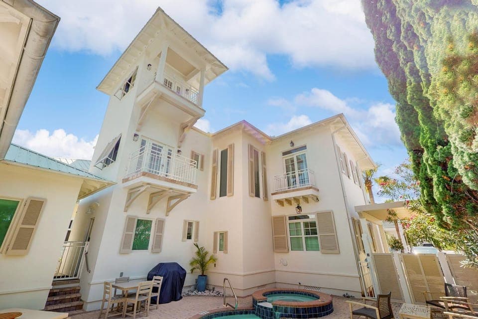 Stylish coastal retreat with pool hot tub & tennis - steps from the beach House in Carillon Beach
