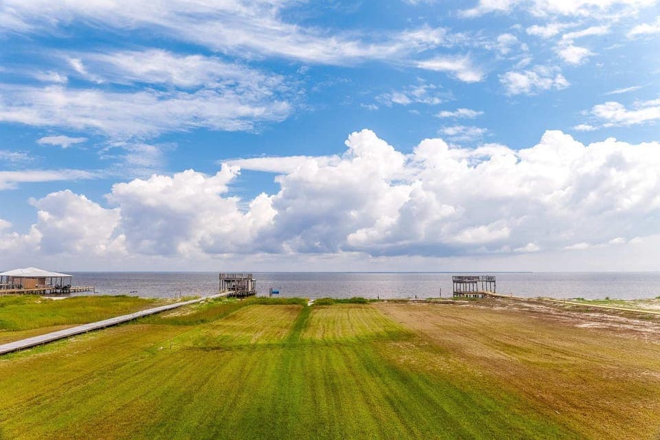Bayfront home with beach access & breathtaking water views - dog-friendly House in Dauphin Island