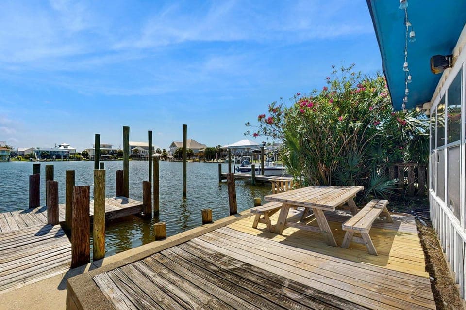 Bayfront home with private dock deck & sleeper porch - dog-friendly House in Dauphin Island