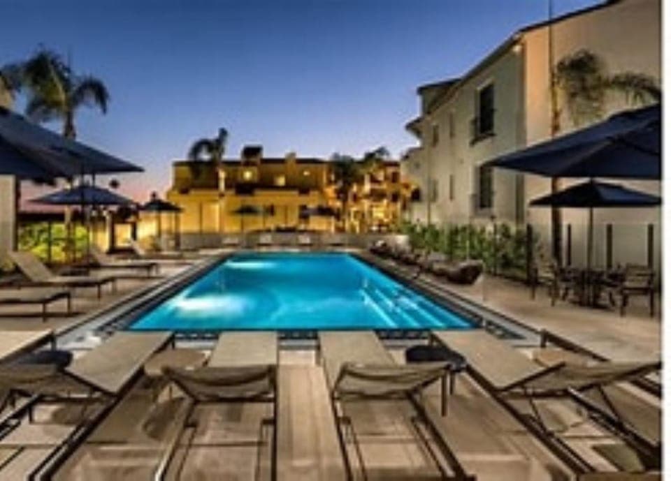 Property building, Patio, Swimming pool, sunbed