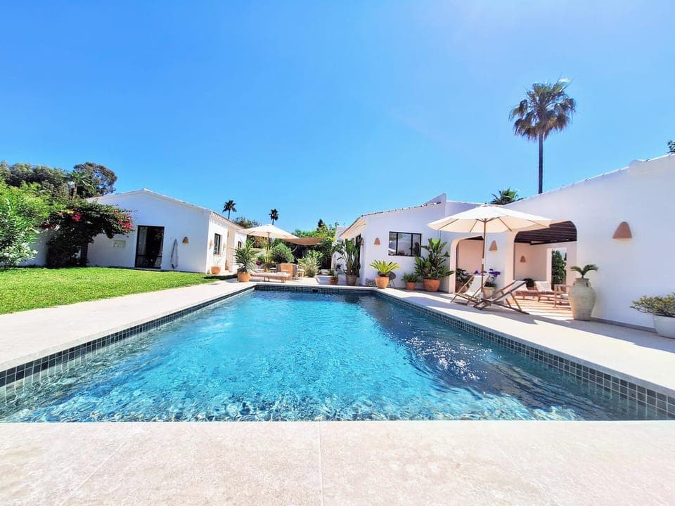 Property building, Living room, Swimming pool
