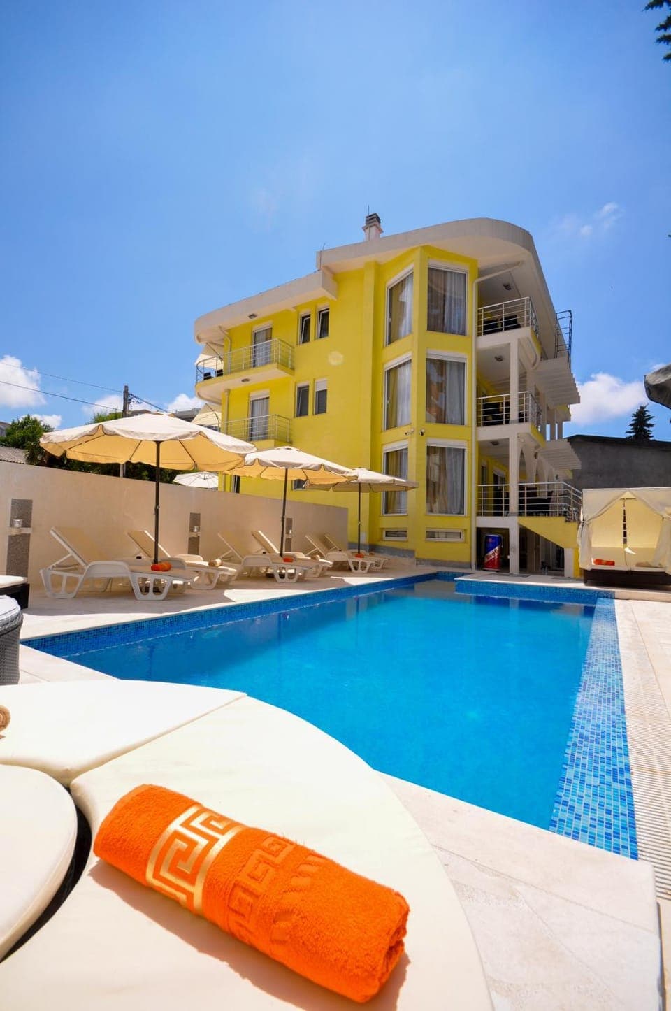 Property building, Patio, Patio, Facade/entrance, Spring, Day, Summer, Beach, Pool view, Swimming pool, Swimming pool, Sunset