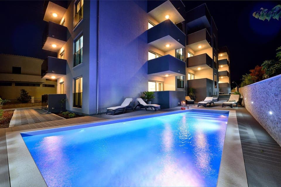 Property building, Night, Swimming pool, Swimming pool