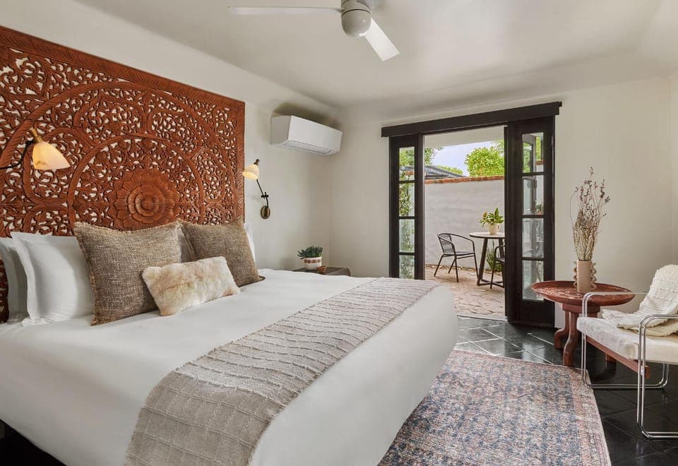 Patio, Bed, Seating area, Bedroom, flat iron, air conditioner