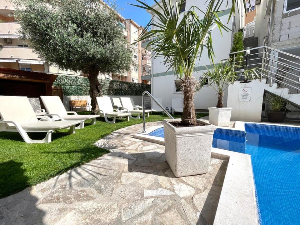 Property building, Patio, Seating area, Garden view, Pool view, Swimming pool, sunbed