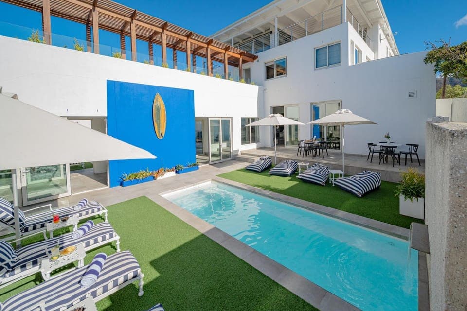 Property building, Day, Seating area, Pool view, Swimming pool, sunbed