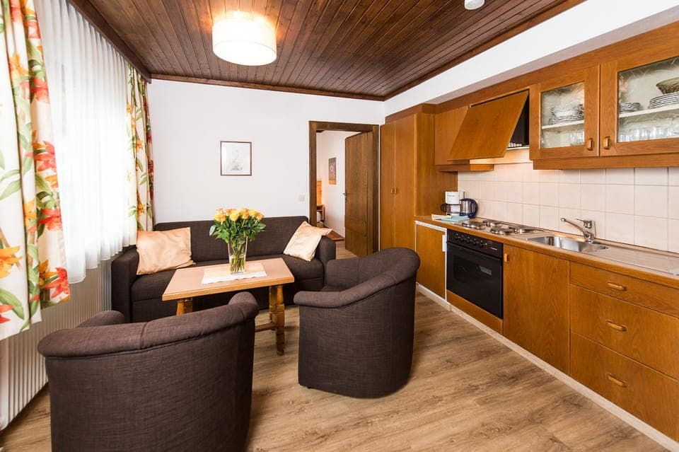 Kitchen or kitchenette, Living room, Seating area, stove