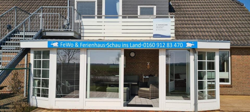 Property building, Facade/entrance, Property logo or sign, Garden