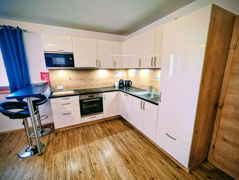 Kitchen or kitchenette, stove, kitchen