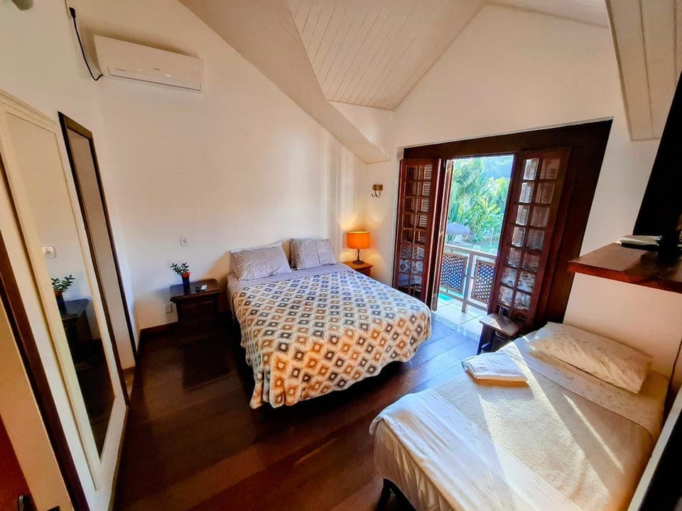 Bed, Living room, Photo of the whole room, Bedroom, towels, air conditioner