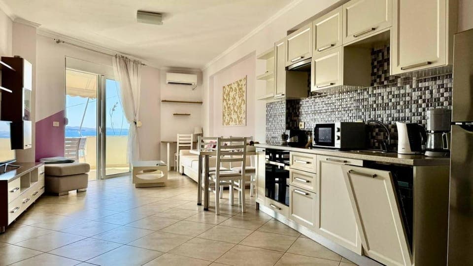 Coffee/tea facilities, Kitchen or kitchenette, Living room, Seating area, Dining area, dishwasher, oven, stove, toaster, air conditioner