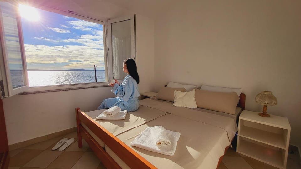 People, View (from property/room), Bedroom, Sea view