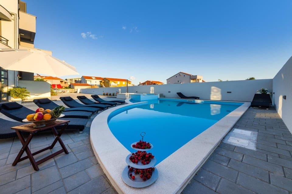 Property building, Seating area, Swimming pool