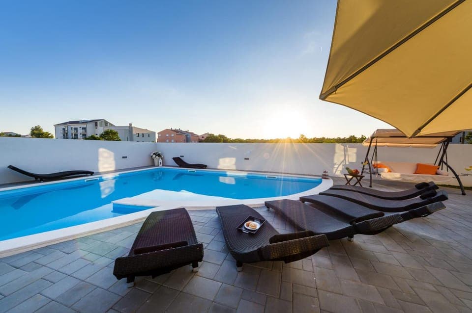 Property building, Seating area, Swimming pool